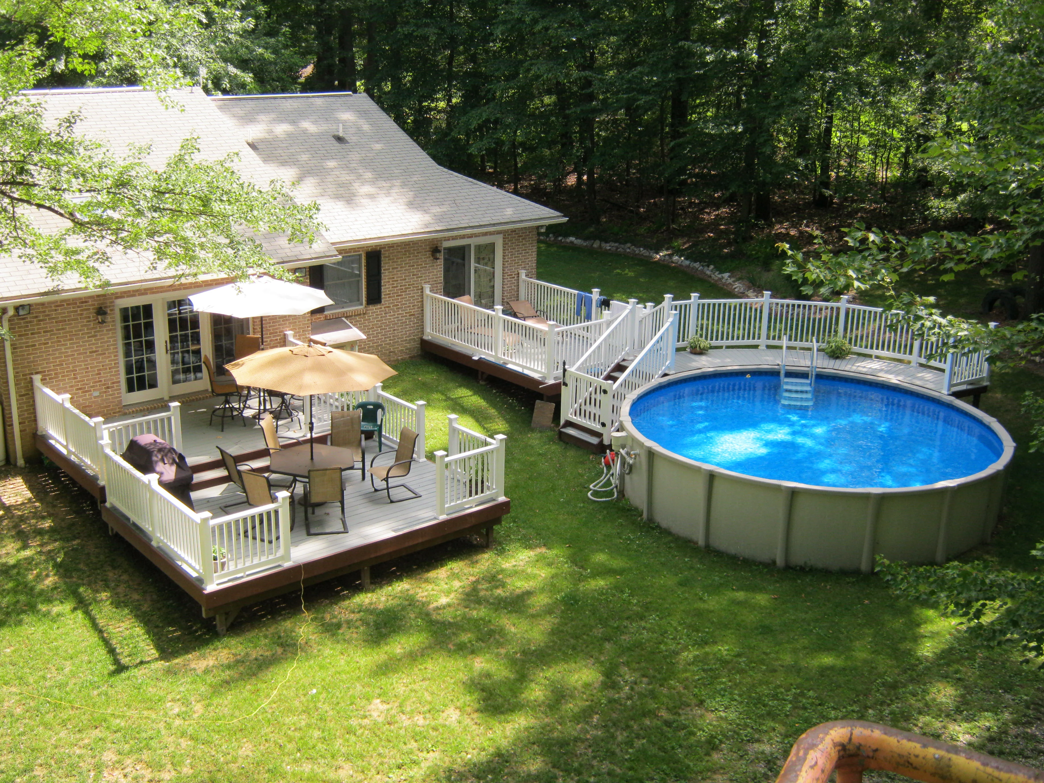 Custom swimming pool design with elegant proportions, clear water and coordinated outdoor finishes